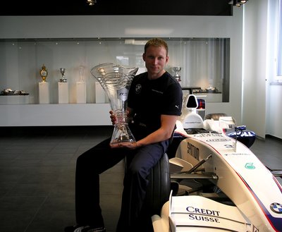 Andrius Šerkšnas su 2008 metais Roberto Kubicos pirmą kartą istorijoje "Sauber" komandai laimėta Kanados GP taure