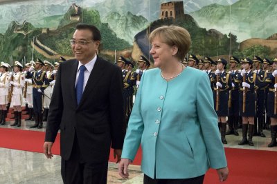 Li Keqiang ir Angela Merkel 