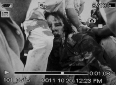 Paviešinta sužeisto M.Gaddafi nuotrauka