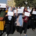 Per Talibano leistas eitynes Afganistano moterys reikalavo teisių ir paramos