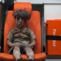 Sukrečianti Sirijos realybė: iš pastato griuvėsių ištrauktas berniukas