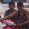 Po Filipinuose praūžusio taifūno prasidėjo galingas potvynis