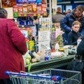 What do experts think is behind rising prices in Lithuania?