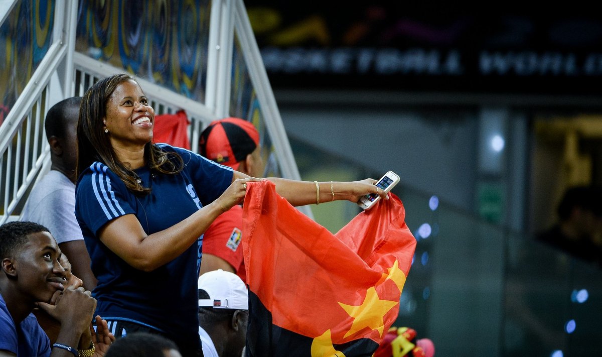 Angolan basketball team supporter with Angolan flag