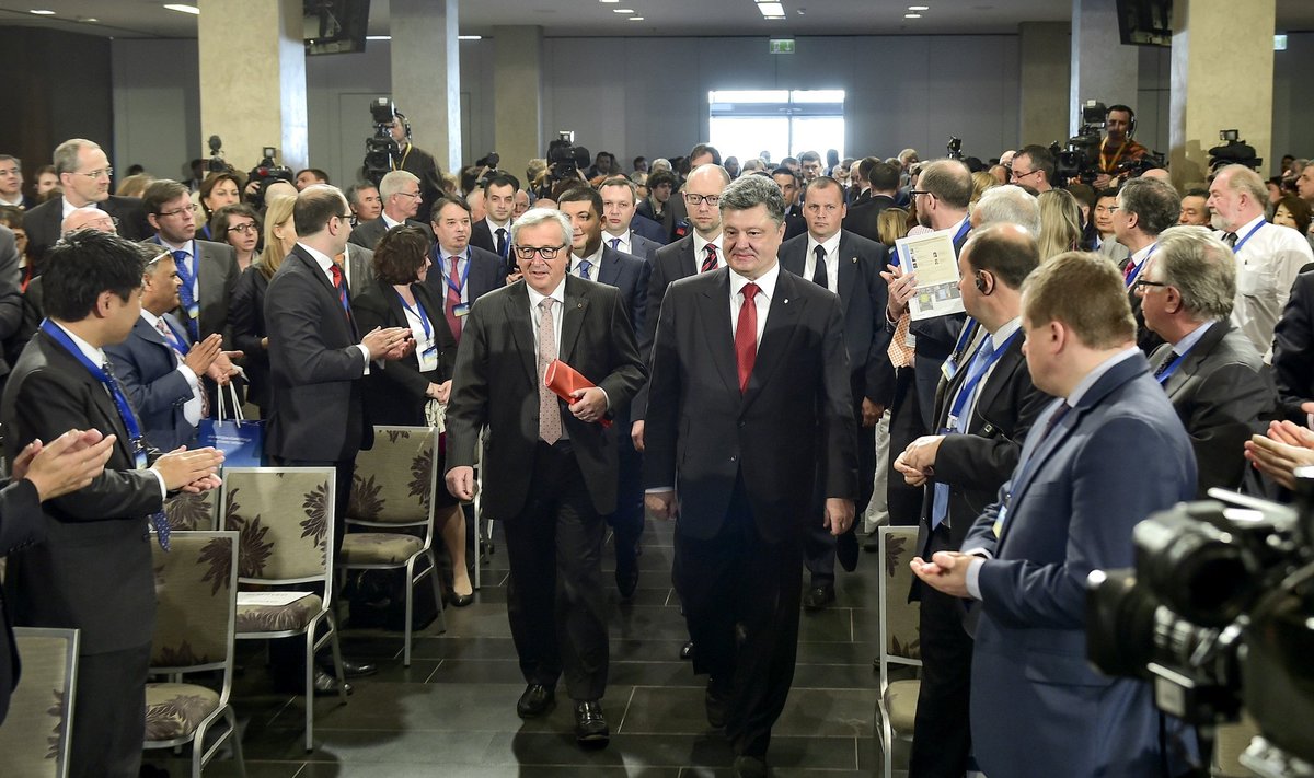 EU Commission President Jean-Claude Juncker and Ukraine's President Petro Poroshenko