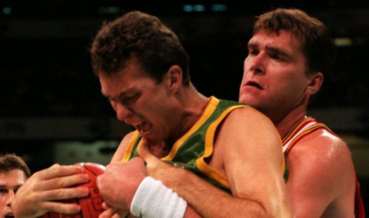Australia's John Dorge (left) is grabbed by Lithuania's Arvydas Sabonis during the playoff for bronze at the 1996 Atlanta Olympic Games. Picture courtesy of Basketball Australia.