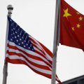 Kinija skelbia sankcijas keturiems JAV pareigūnams dėl jų išsakytos kritikos
