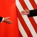 Trumpo patarėjas: pirminė prekybos sutartis su Kinija bus pasirašyta kitą savaitę