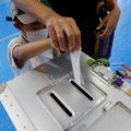 Japonijoje vyksta aukštesniųjų parlamento rūmų rinkimai