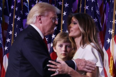 Donaldas Trumpas su žmona Melania ir sūnumi Barronu