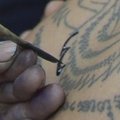 Tailande tūkstančiai žmonių susirinko į tatuiruočių festivalį