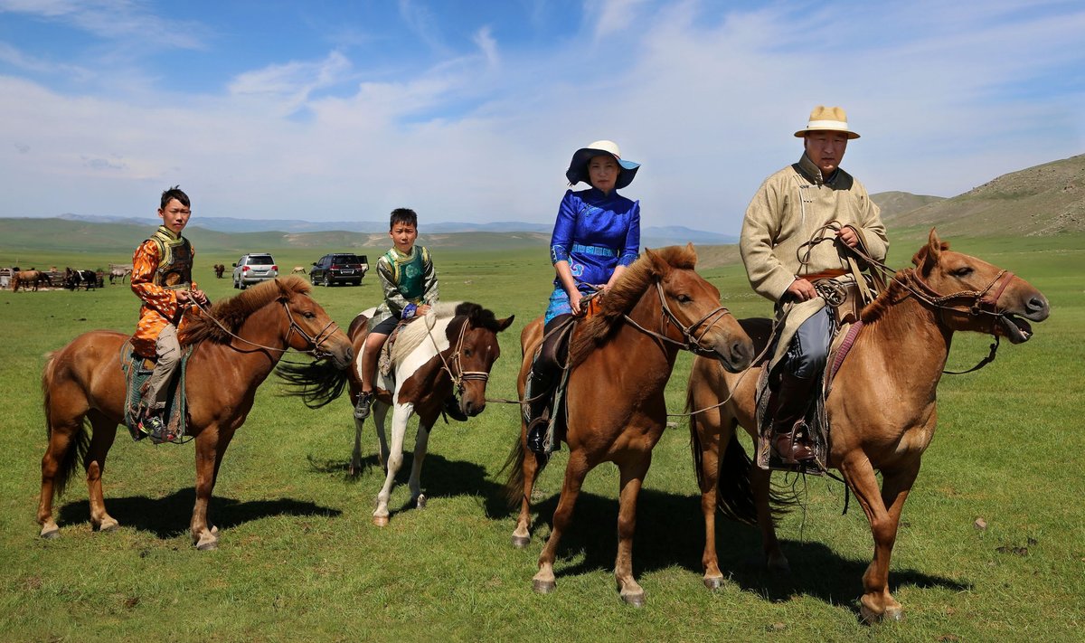 Sanjsuren Boldbaatar horseback riding with his family
