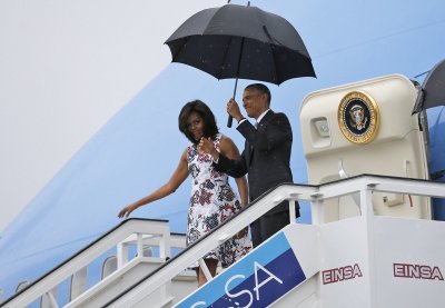 B. Obama su šeima atvyko į Kubą