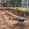Į iškastą gatvę Panevėžyje atsikraustė archeologai: bandys nustatyti po miestu pasislėpusių kapinių ribas