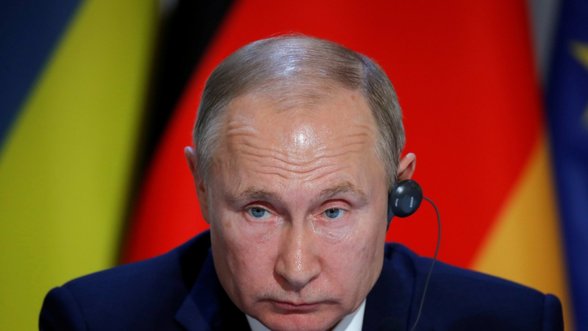 Rusų bankininkas turtą kraunasi plūsdamas Putino ekonominę politiką