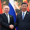 Putinas: pasauliniai konfliktai ir grėsmės padeda „stiprinti“ Rusijos ir Kinijos santykius
