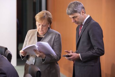 A. Merkel ir Jan Hecker