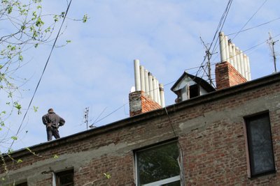 DNIPRO, UKRAINE - MAY 9, 2023 - A man stands on the roof of a residential building affected by the falling debris of a Russian rocket in Dnipro, central Ukraine.//UKRINFORMAGENCY_ukr011763/Credit:Mykola Miakshykov/UKRINFO/SIPA/2305091449/Credit:Mykola Miakshykov/UKRINFO/SIPA/2305091504