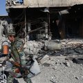 Po Rusijos antskrydžių - sumaištis Sirijoje: kurdų kovotojai užėmė sukilėlių bazę ir pagrobė ginklus