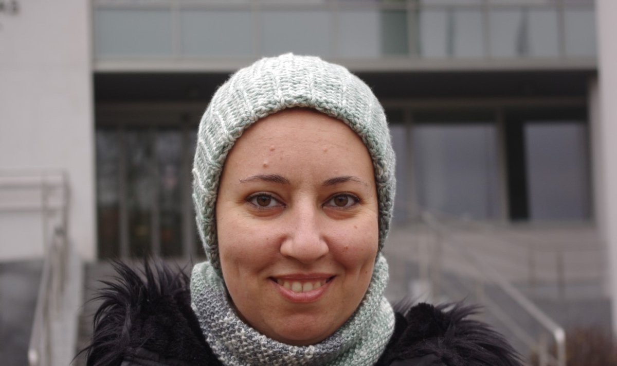 Egyptian student Rasha Geneid is pictured with knit cap and shawl that she knitted herself
