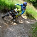 Penkiolikmetis dviračių „downhill“ varžybose nenusileidžia Europos favoritams