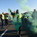 „Geltonųjų liemenių“ protestai grasina parklupdyti Makroną ir Prancūzijos ekonomiką