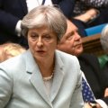 Theresa May sulaukė parlamentarų pykčio dėl duoto leidimo puolimui Sirijoje