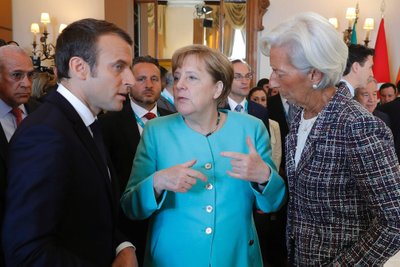 Emmanuelis Macronas, Angela Merkel, ir Christine Lagarde
