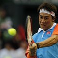 Vyrų teniso turnyro Tokijuje nugalėtojo titulą ginantis japonas K. Nishikoris pateko į ketvirtfinalį