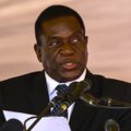 Nuo pareigų nušalintas Zimbabvės viceprezidentas sugrįžo į šalį