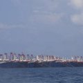 Įtampa Pietų Kinijos jūroje: Filipinai savo vandenyse praneša apie šimtus „žvejų“ laivų, pilotuojamų kinų kariškių