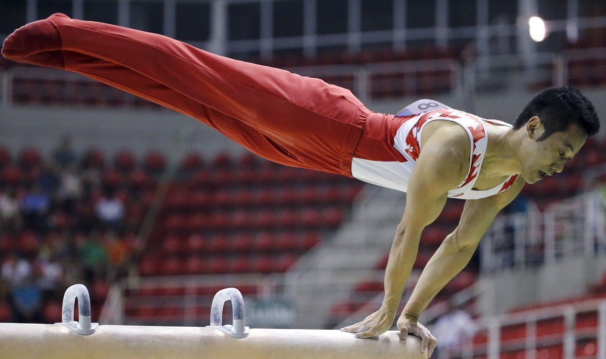 Kanados gimnastas Kennethas Ikeda