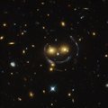 „Hubble“ nufotografavo tarpgalaktinę šypsenėlę