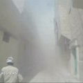 Nufilmuota, kaip Alepe iš griuvėsių išgelbėjama moteris