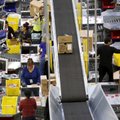 Įtakinga JK profsąjunga pareikalavo pradėti tyrimą dėl darbo saugos „Amazon“ sandėliuose