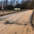 Vilnius district municipality backs further asphalt-paving of PM's street