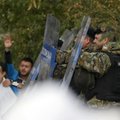 Makedonijos policija imigrantų įniršį malšino ašarinėmis dujomis
