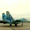 P. Porošenka Gynėjų dieną skraidė naikintuvu Su-27