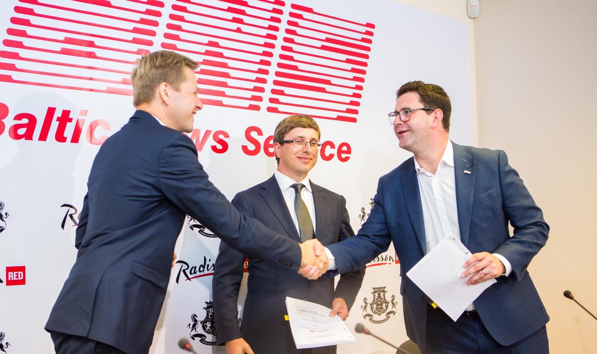 Remigijus Šimašius, Marius Žemaitis and David Jenkins during press conference in Viln