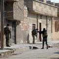 Sirijoje tęsiantis kautynėms po IS išpuolio prieš kalėjimą žuvo mažiausiai 120 žmonių