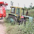 Kretingos rajone apvirtęs traktorius prispaudė žmogų