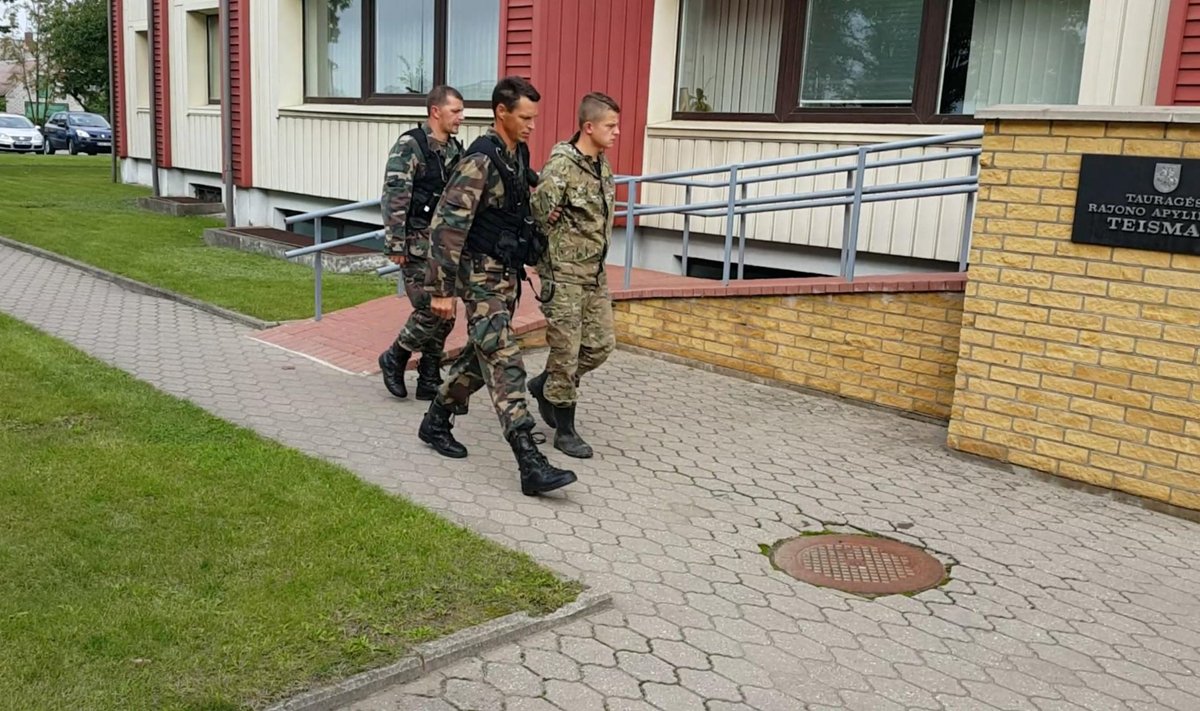 Russian citizen who claimed to be a Russian border guard is taken to the court