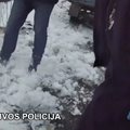 Eišiškėse įkliuvo samanę po sniegu slepianti prekeivė