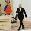 Putinas vyks į pirmąją užsienio kelionę po arešto orderio išdavimo