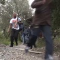 Pabėgėliams kirsti Italijos sieną padedantys savanoriai teisme gauna neliečiamybę
