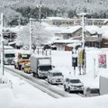 Japonijoje smarkus snygis sukėlė transporto chaosą