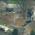 Vašingtono priemiestyje verslo klasės lėktuvui nukritus ant namo žuvo šeši žmonės