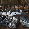 Bando paneigti Rusijos žiaurumus: skelbia, kad Iziume palaidoti žuvę Ukrainos kariai, kurių Kijevas atsisakė