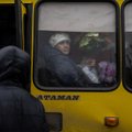 Rusai iš artilerijos apšaudė socialinį autobusą, kuriuo žmonės važiavo į Charkivą