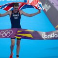 Olimpinių medalių likimą išsiaiškino triatlonininkai ir burlentininkai